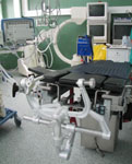 Операционный стол и скоба жесткой фиксации головы (Мейфилда-Кисса)